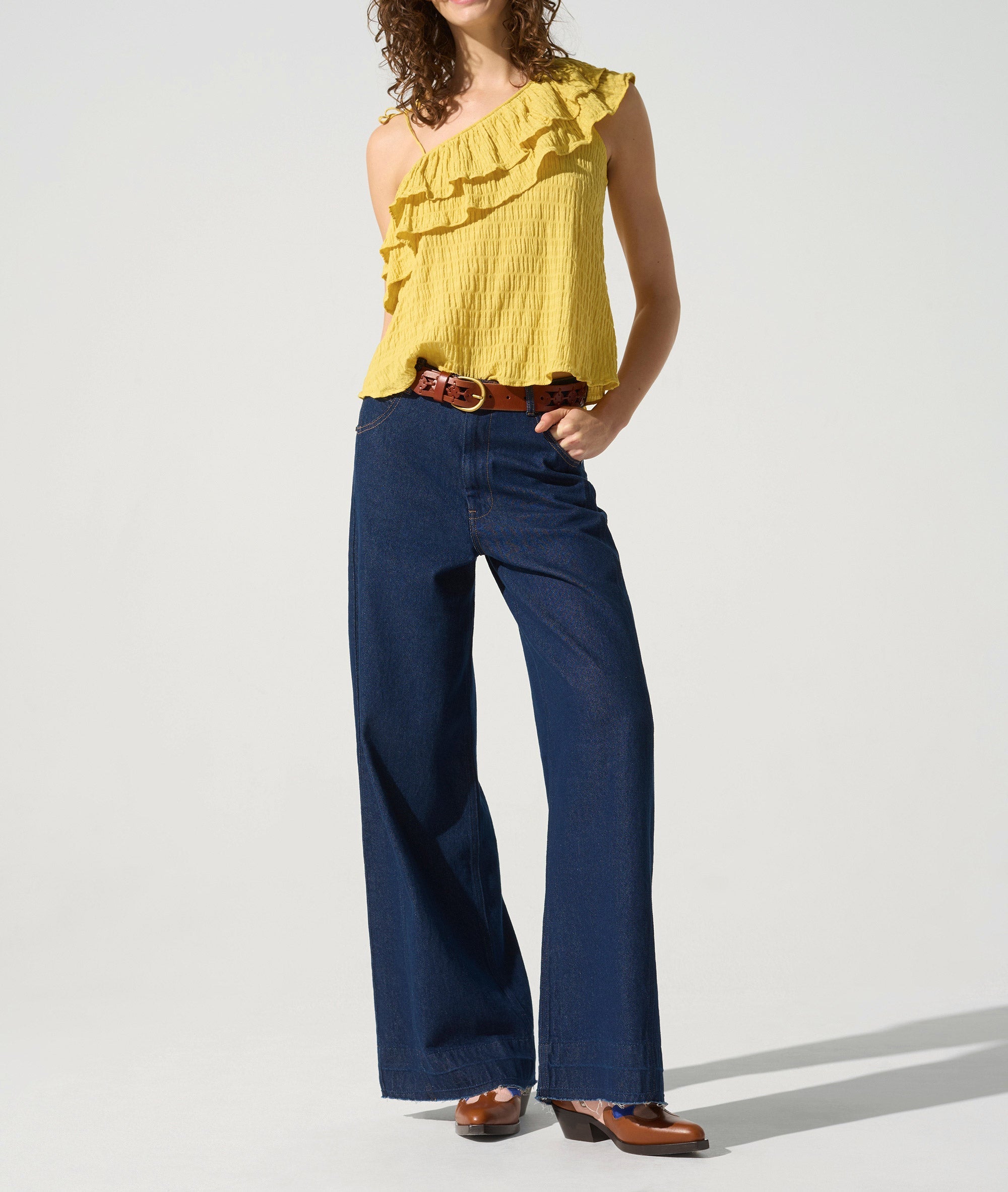 Top asymétrique acoté