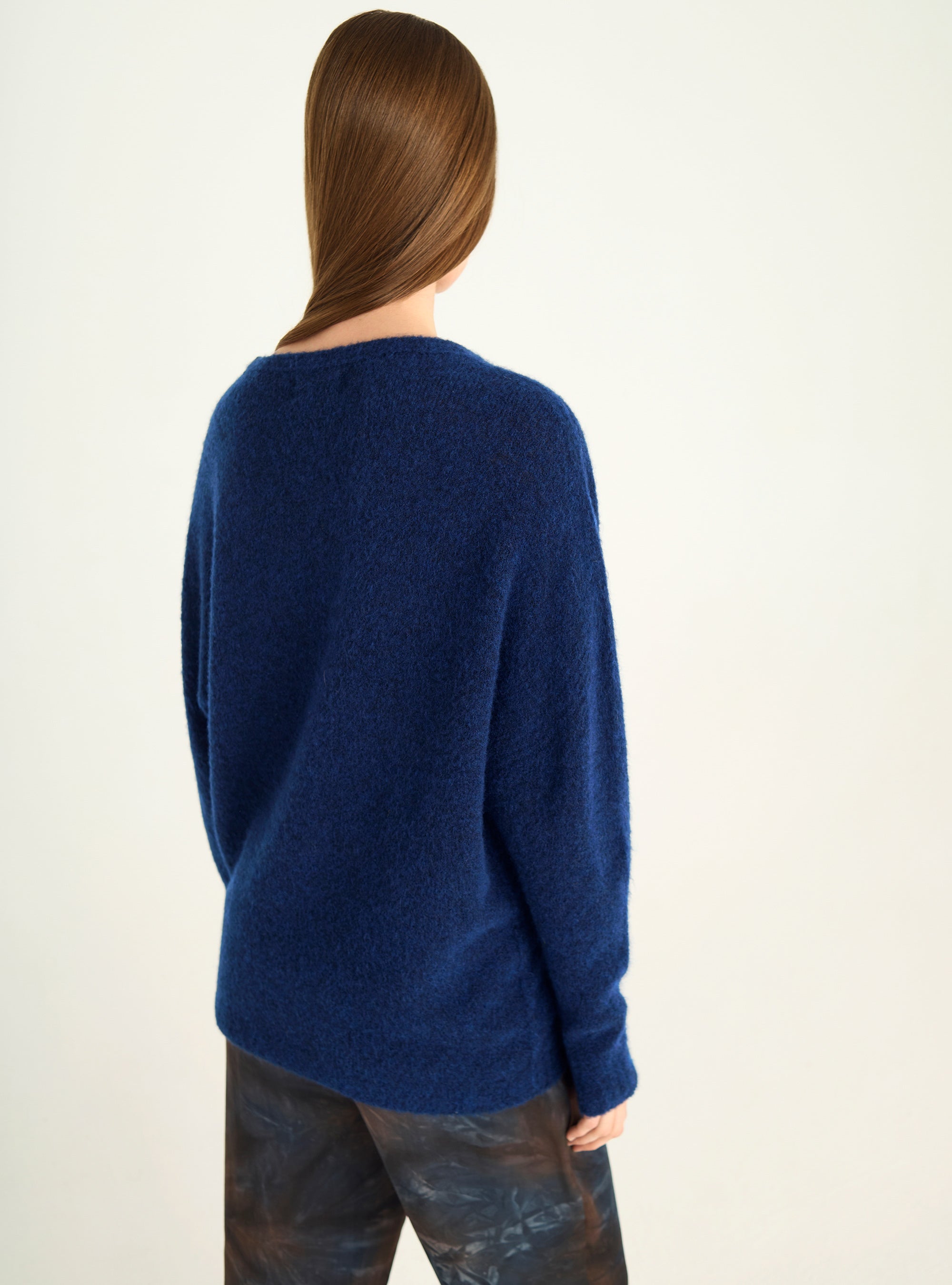 Loose-fitting natural wool sweater