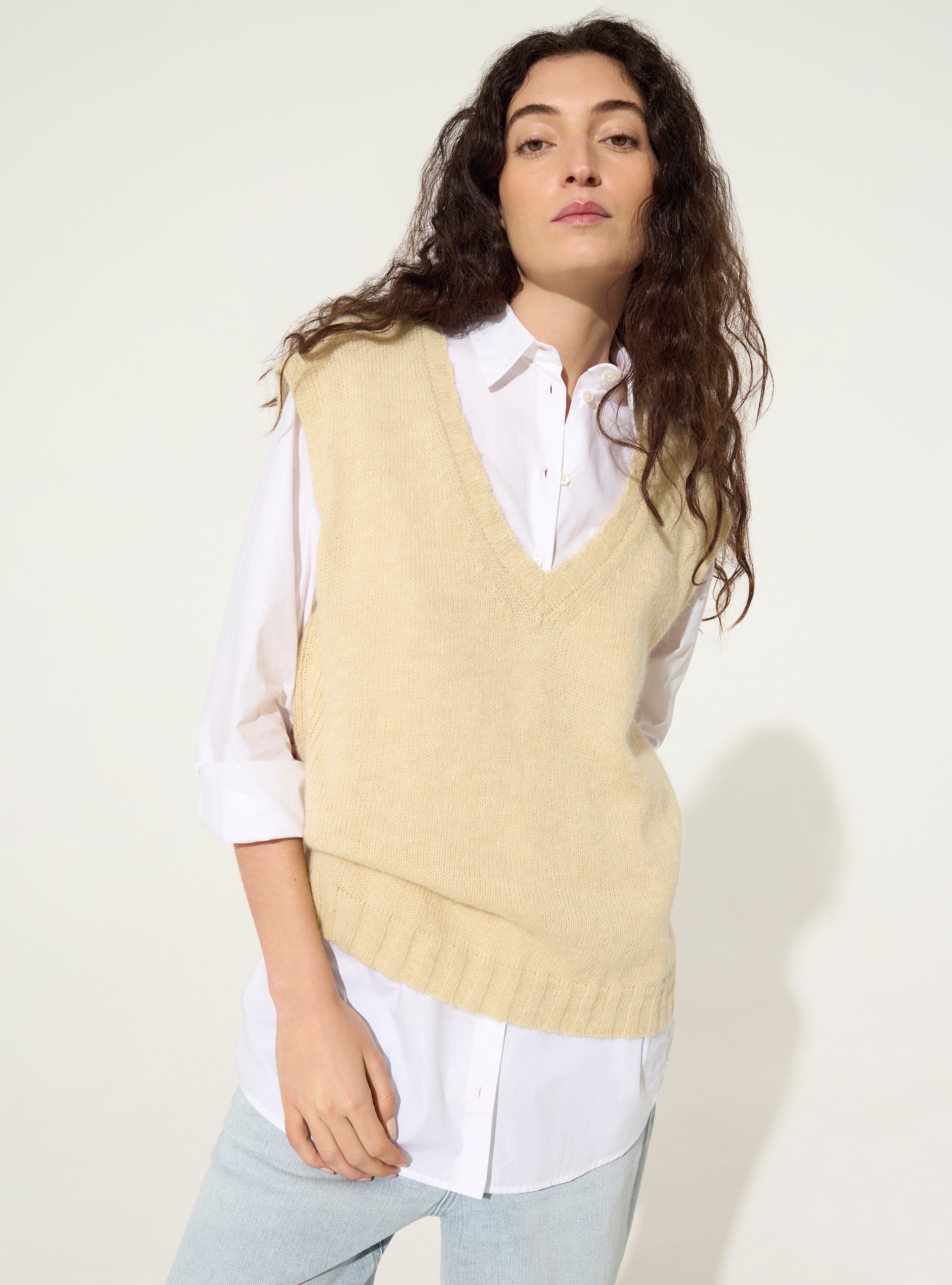 White sleeveless sweater