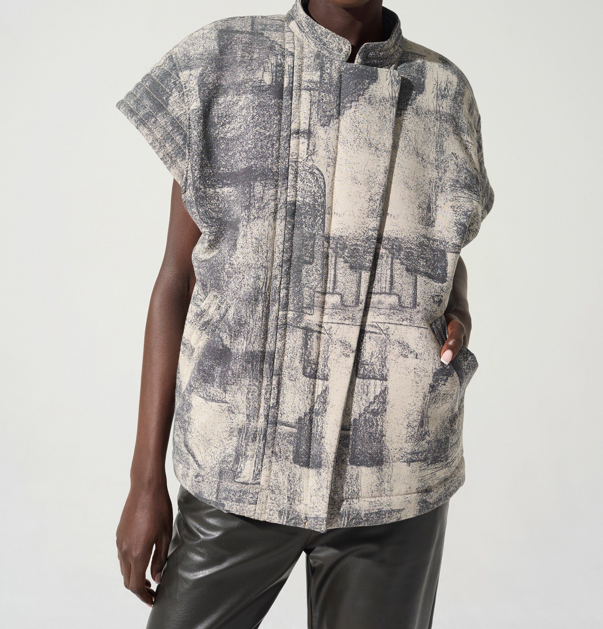 Quilted cap sleeve jacket