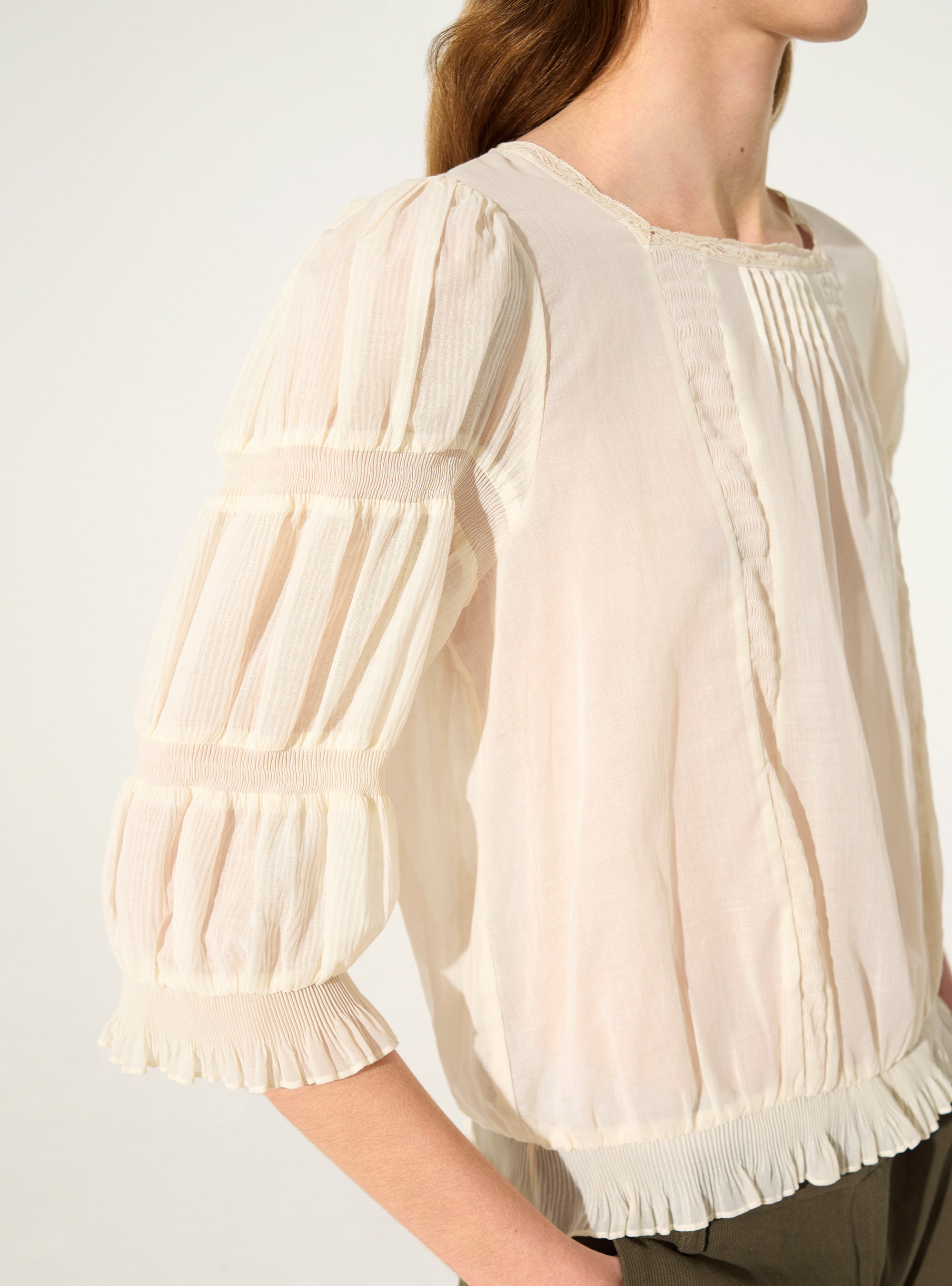 Pleated blouse and Calais-Caudry® lace