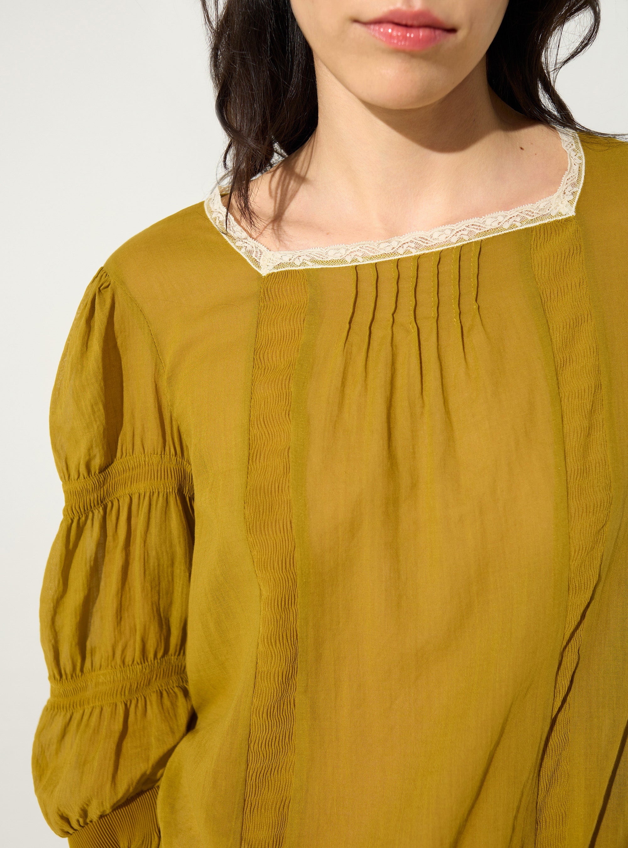 Pleated blouse and ochre yellow Calais-Caudry® lace