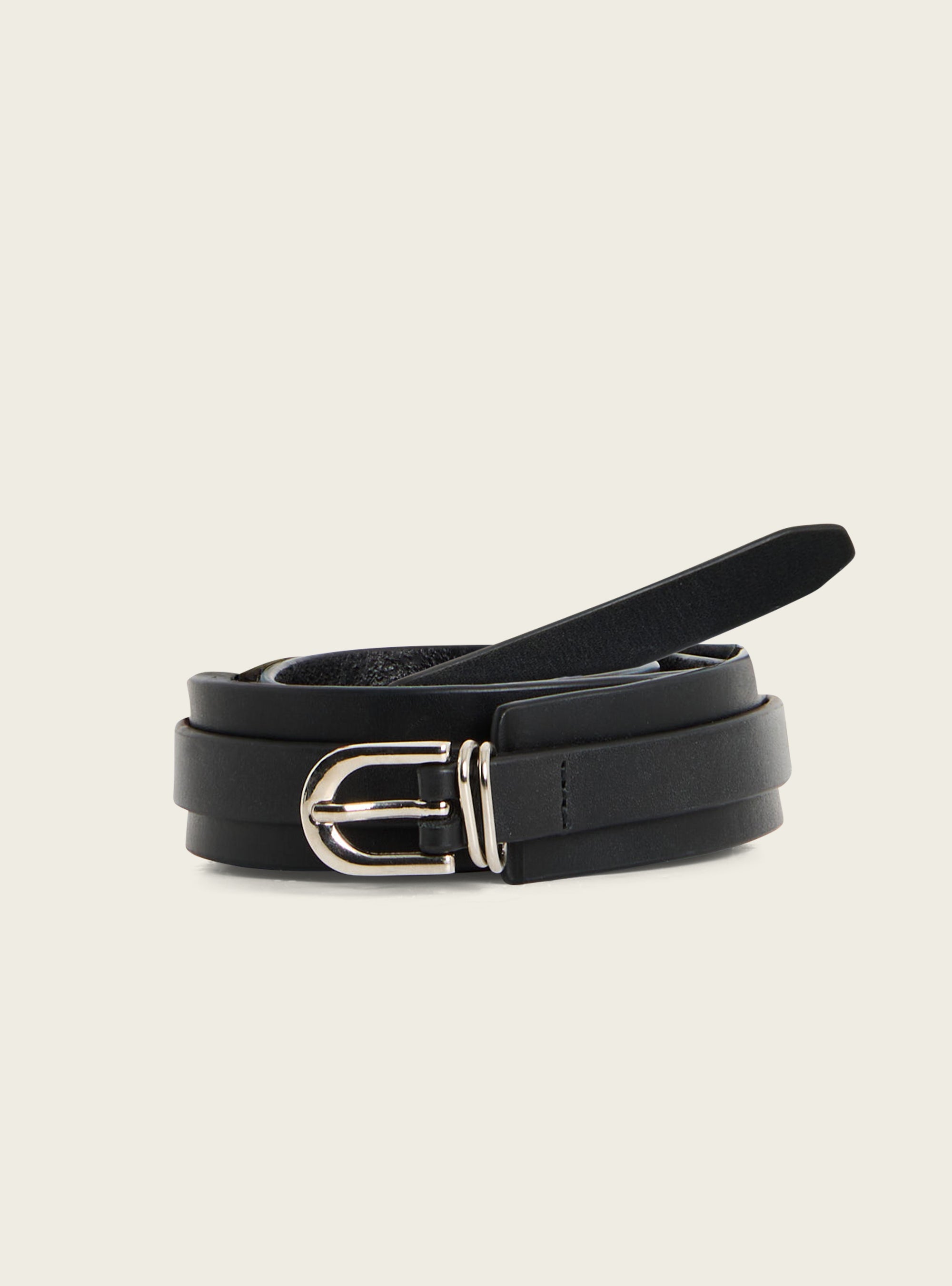 Leather belt with silver eyelets