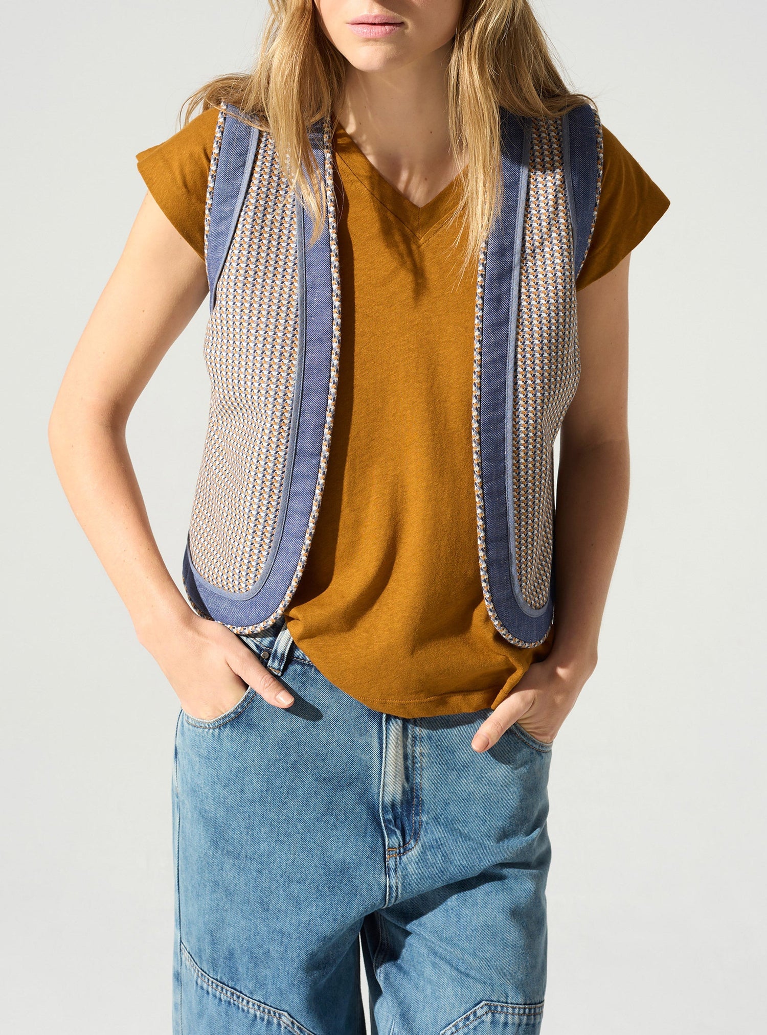 Gilet sans manches acoté 