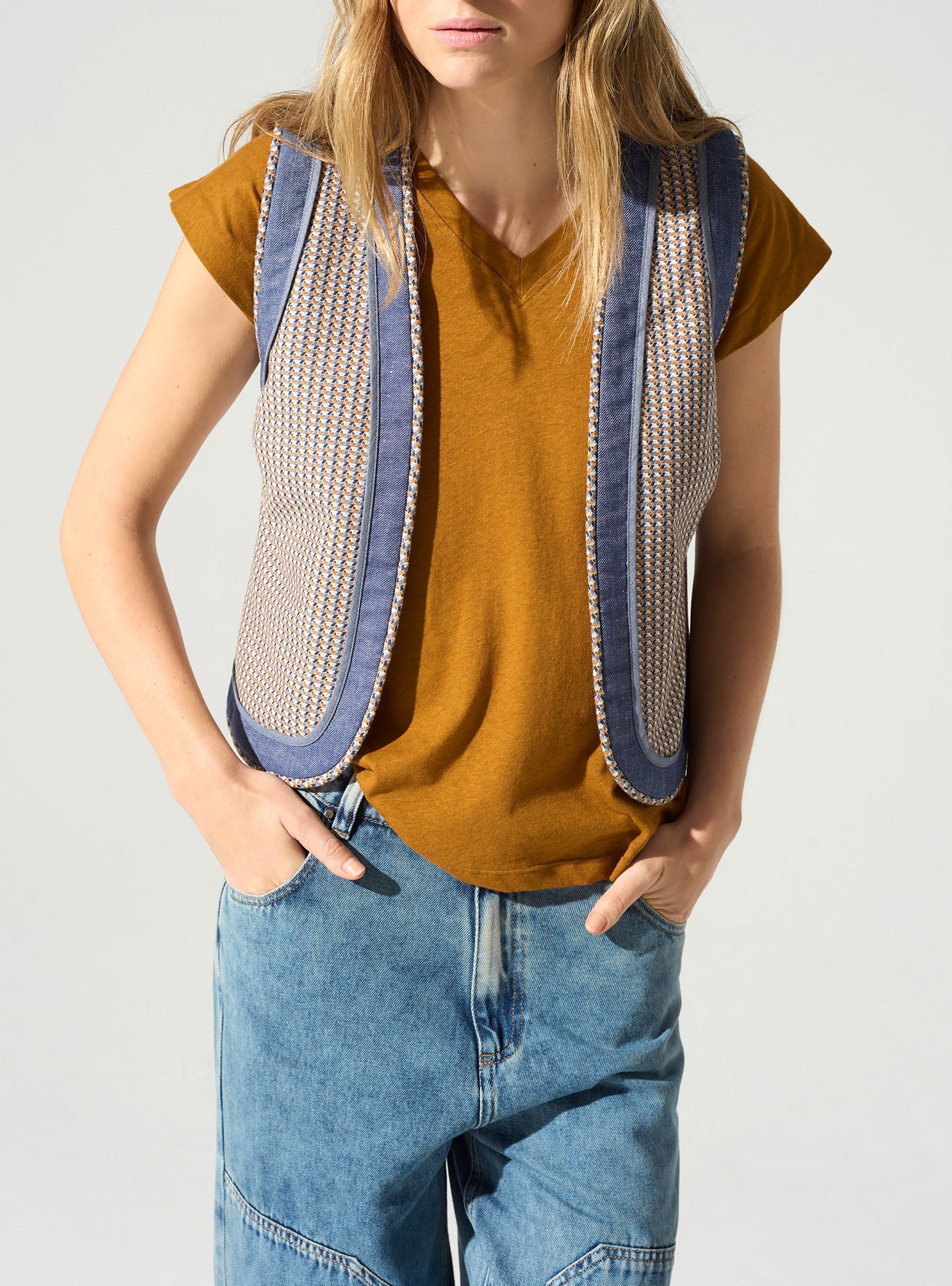 Gilet sans manches acoté 