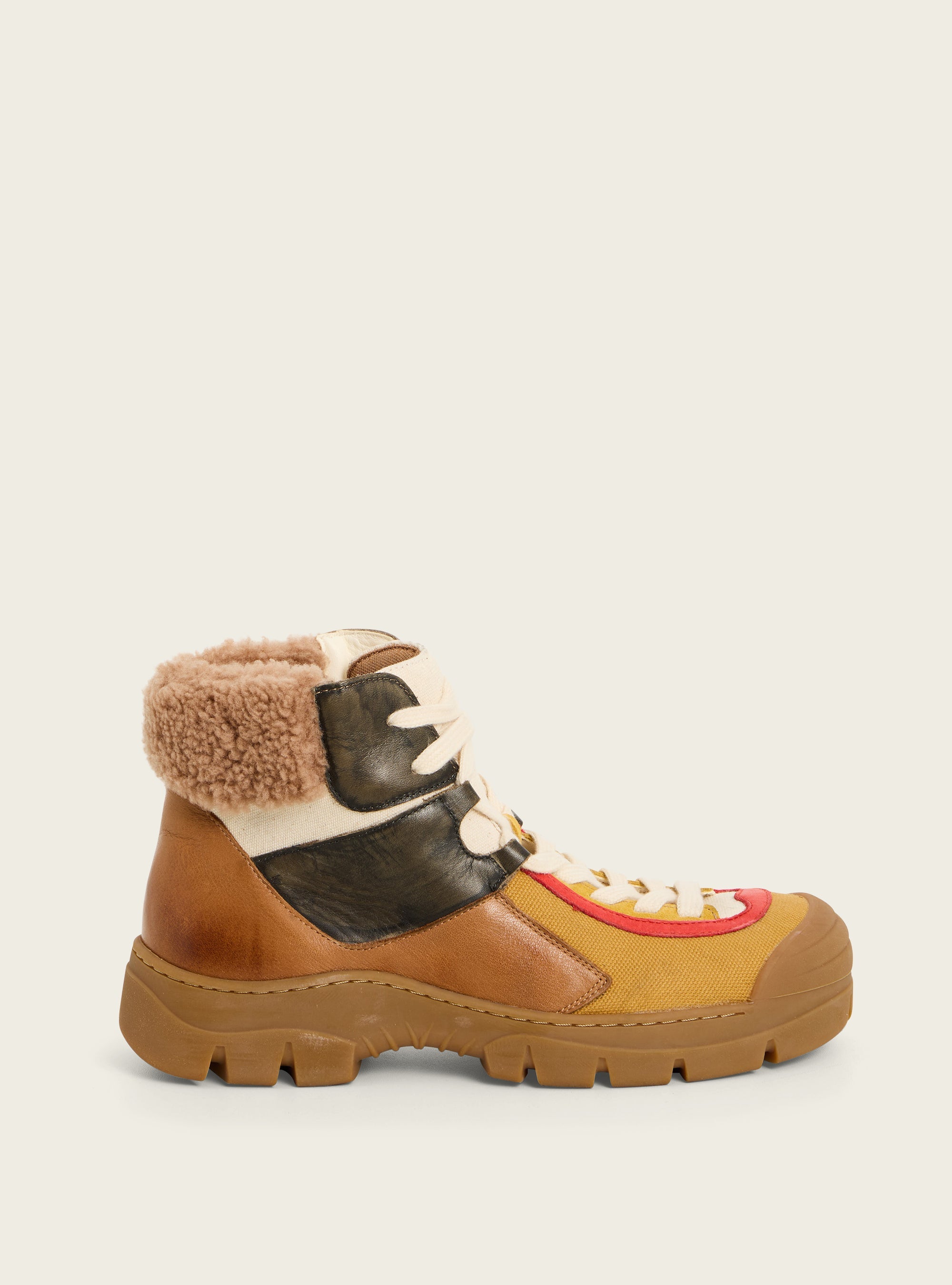 Bottillons en cuir et toile acoté 