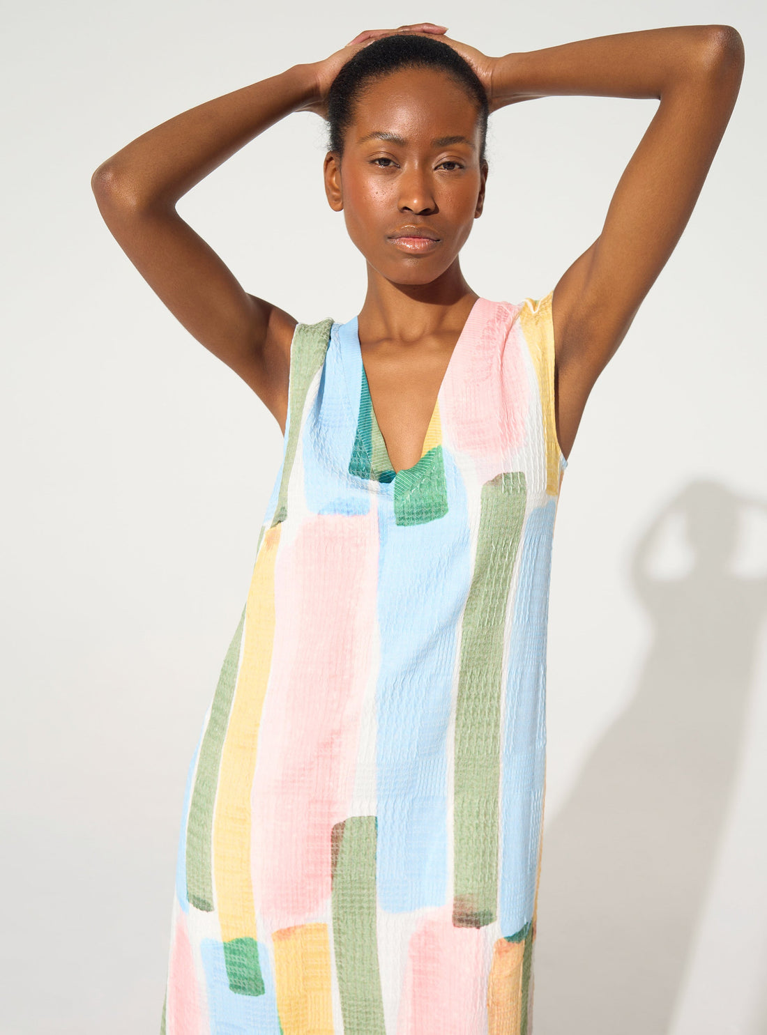 fitted dress with yellow striped print