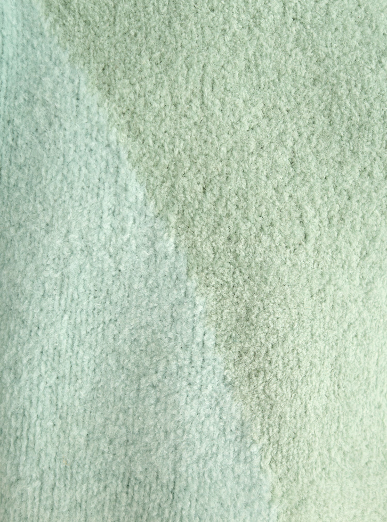 Sleeveless terry wool sweater