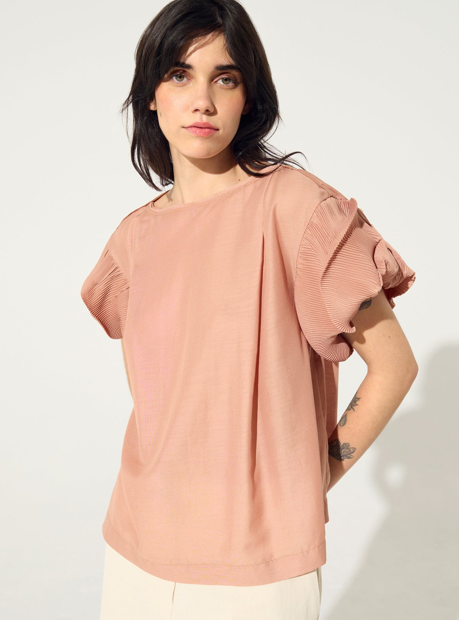 Pink pleated blouse