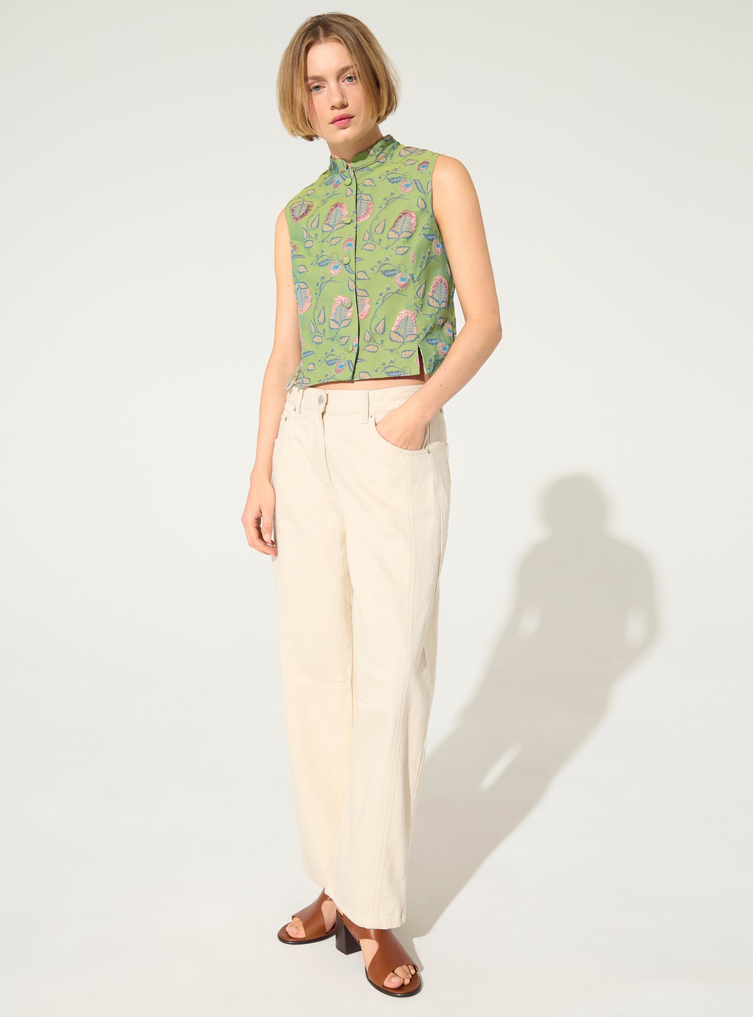 Fitted vest with green print